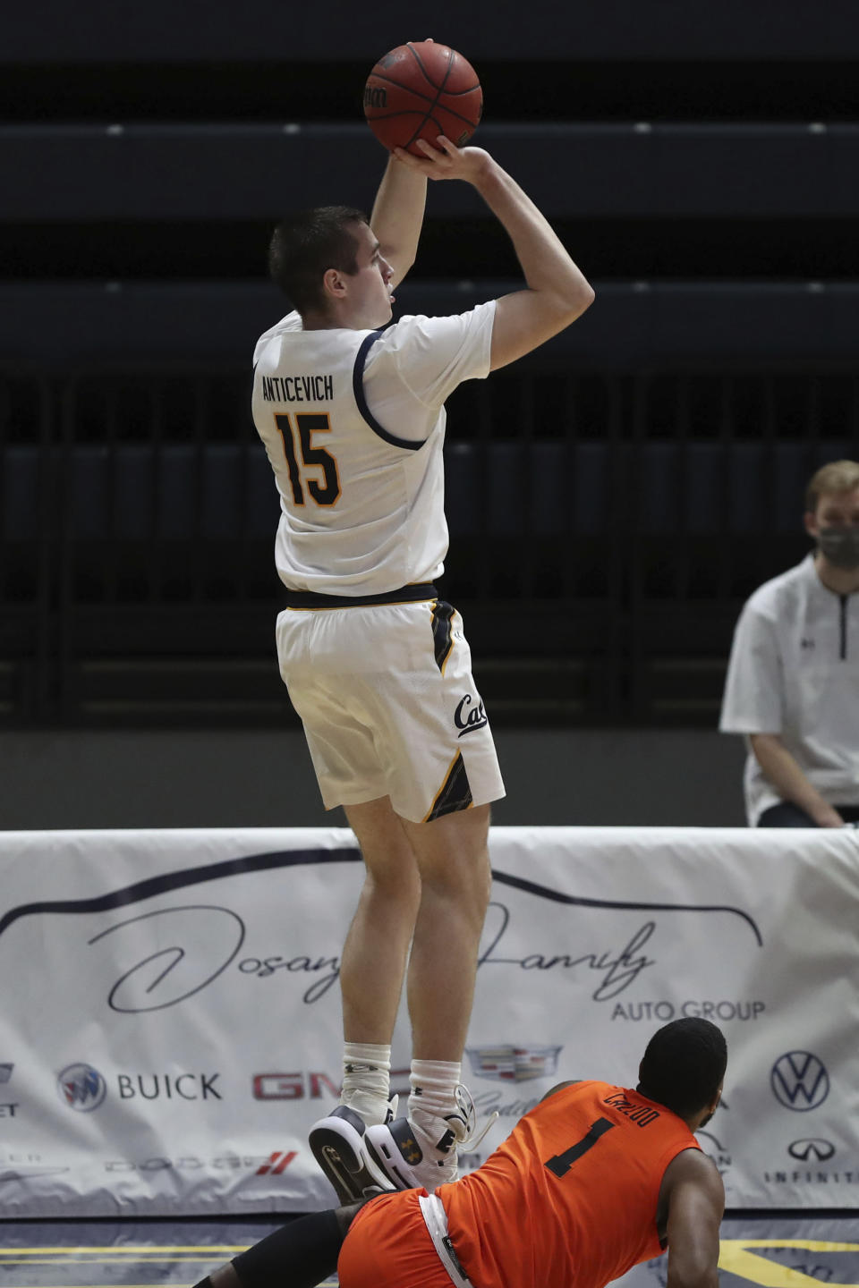 California forward Grant Anticevich shoots over Oregon State forward Maurice Calloo during the first half of an NCAA college basketball game in Berkeley, Calif., Thursday, Feb. 25, 2021. (AP Photo/Jed Jacobsohn)