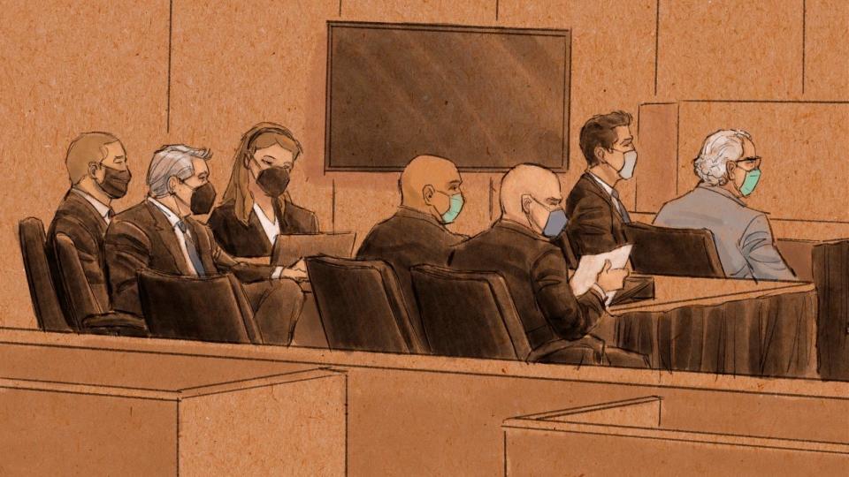 In this courtroom sketch, three former Minneapolis officers charged in the death of George Floyd appear in federal court on Tuesday, Jan. 11, 2022, in St. Paul, Minn. Floyd died in May 2020 after Derek Chauvin pressed his knee against his neck as Floyd, who was handcuffed, said he couldn't breathe. Tou Thao, J. Kueng and Thomas Lane are charged that they deprived Floyd of his rights while acting under government authority. Thao and Kueng are also charged with willfully depriving Floyd of his right to be free from unreasonable force by failing to stop fellow Officer Chauvin from pressing his knee into Floyd's neck.