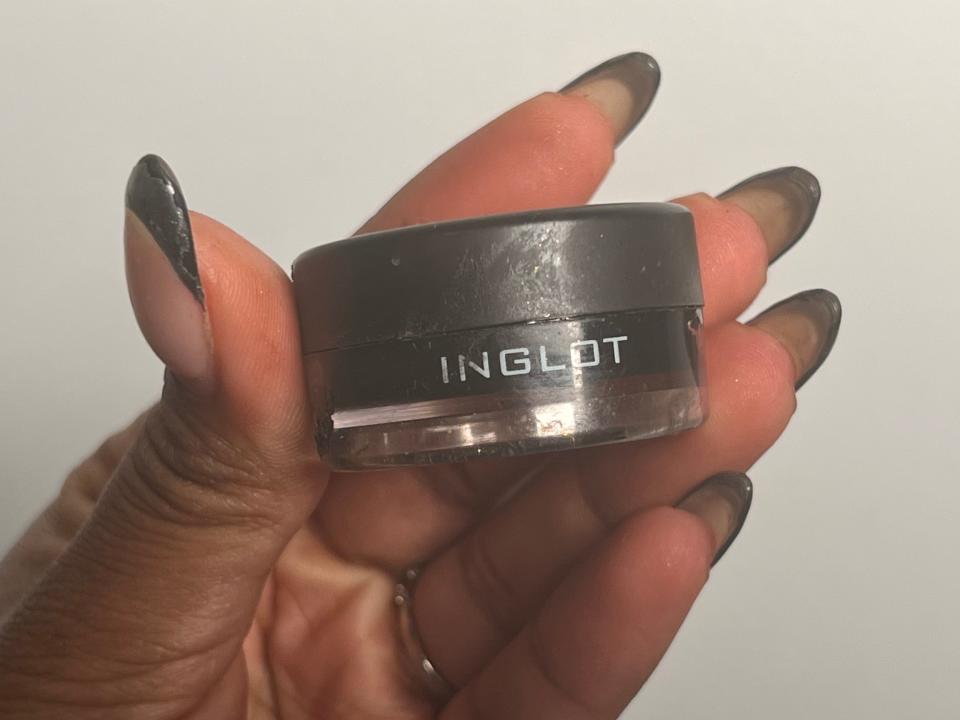 The writer holds a pot of Inglot gel liner