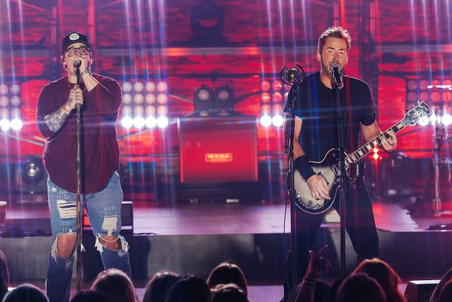 <p>Catherine Powell/Getty Images for CMT</p> HARDY and Chad Kroeger of Nickelback performing on 'CMT Crossroads: Nickelback & HARDY'