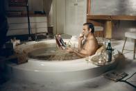 <p>Sean Connery takes a relaxing bath with a vodka martini on the set of <em>Diamonds Are Forever.</em></p>