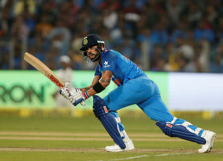 India's captain Virat Kohli plays a shot. REUTERS/Danish Siddiqui