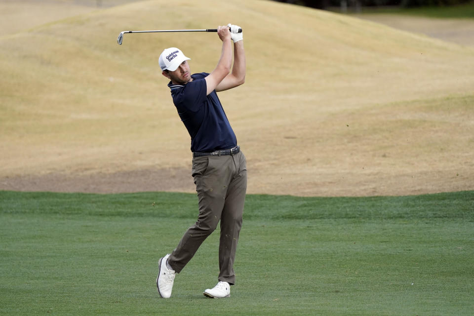 Patrick Cantlay watches his shot from the ninth fairway during the second round of the American Express golf tournament on the Nicklaus Tournament Course at PGA West on Friday, Jan. 21, 2022, in La Quinta, Calif. (AP Photo/Marcio Jose Sanchez)