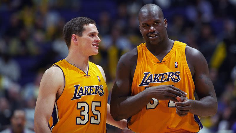 Shaquille O’Neal and Mark Madsen of the Los Angeles Lakers speak during an NBA game against the Miami Heat at the Staples Center in Los Angeles, Calif. Madsen was just named head coach at Cal, a move O’Neal endorsed.