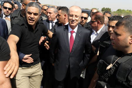 Palestinian Prime Minister Rami Hamdallah arrives to take control of Gaza from the Islamist Hamas group, in the northern Gaza Strip October 2, 2017. REUTERS/Mohammed Salem