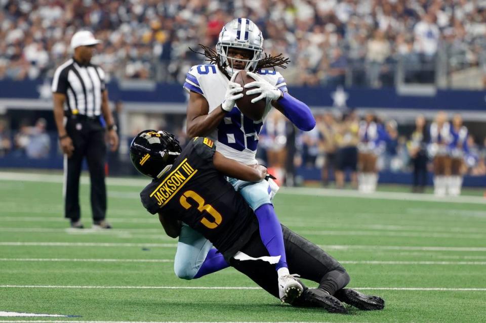 Washington Commanders cornerback William Jackson III (3) makes the stop after Dallas Cowboys wide receiver Noah Brown (85) catches a pass in the second half of a NFL football game in Arlington, Texas, Sunday, Oct. 2, 2022. (AP Photo/Michael Ainsworth)