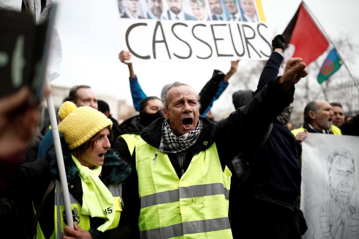 Protesters wearing yellow vests demonstrate during their 56th round of protests with a backdrop of social discontentment: REUTERS