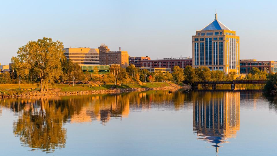 Reflection of downtown Wausau, Wisconsin in the Wisconsin River in Late summer.