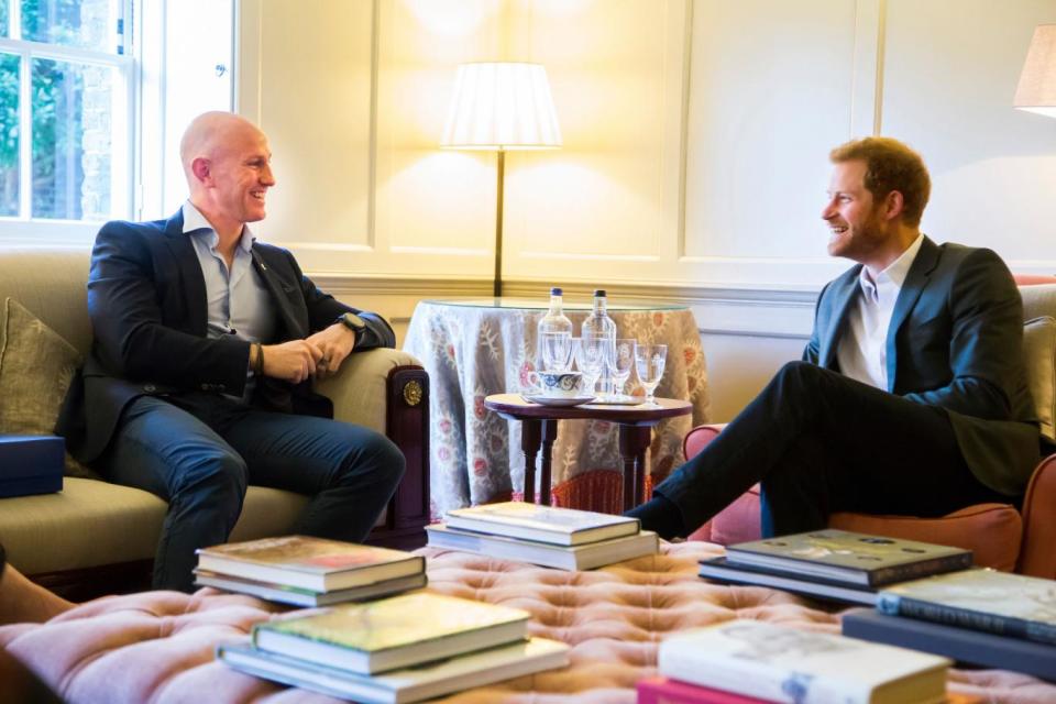 Mental health: Prince Harry chats to Dean Stott about the Heads Together campaign (PA)
