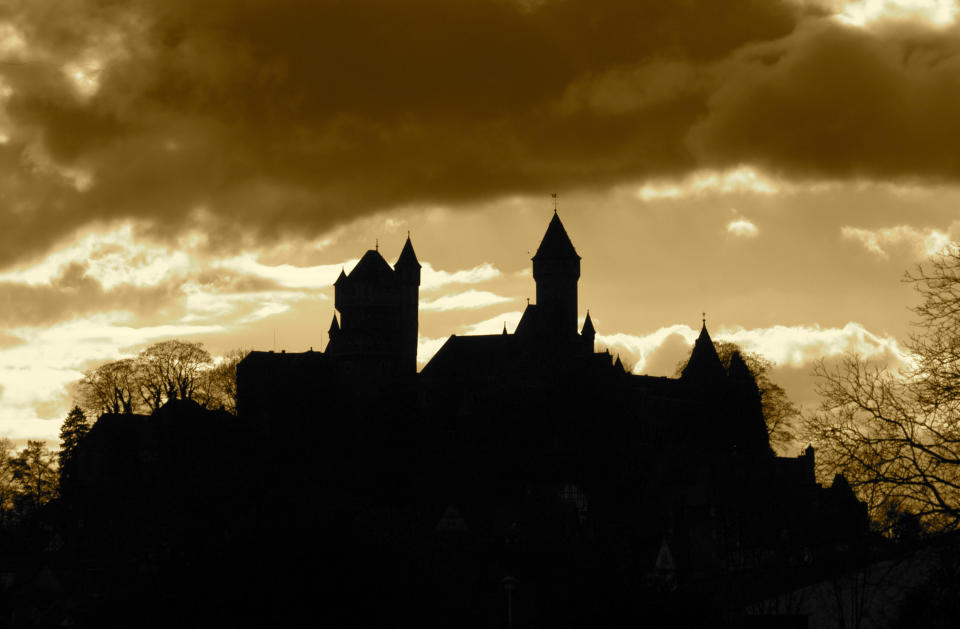 a silhouette of a castle