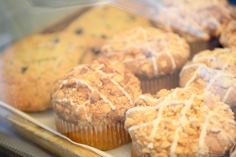 Muffins sit in the pastry case at Rooted Coffeehouse in Evans, Ga., on Wednesday, Sept. 13, 2023.