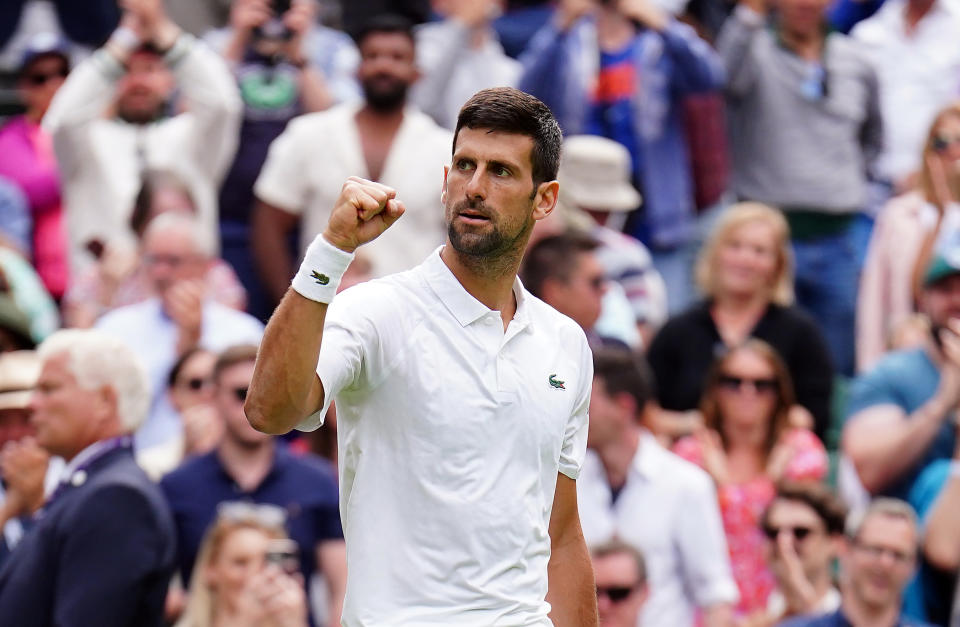 Novak Djokovic celebrates after beating Pedro Cachin in the first round of Wimbledon on Monday at the All England Lawn Tennis and Croquet Club. (Photo by Zac Goodwin/PA Images via Getty Images)