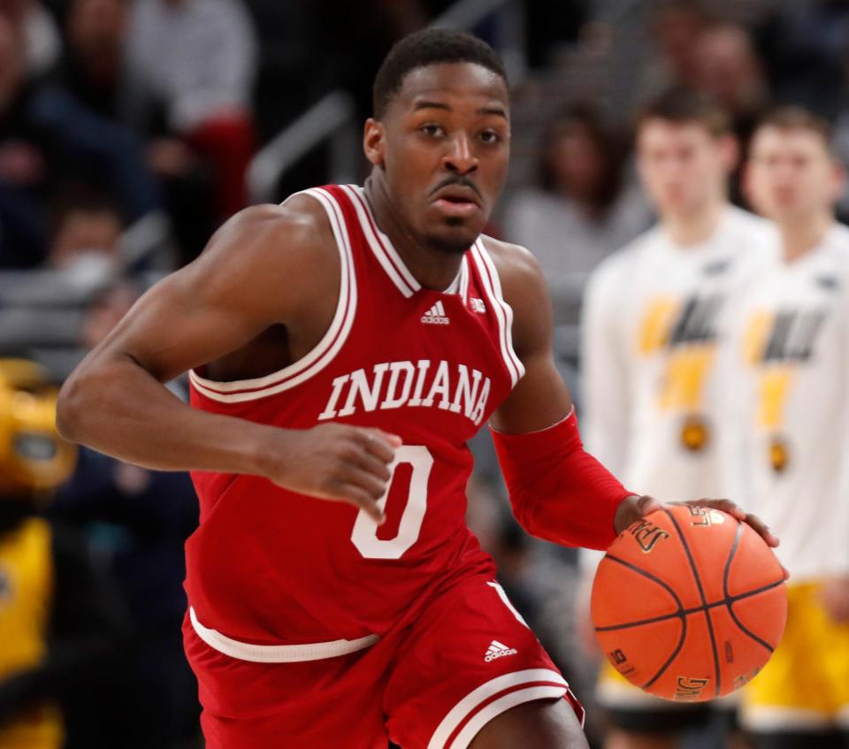 Indiana Hoosiers guard Xavier Johnson (0) drives to the basket during the men’s Big Ten tournament game against the Iowa Hawkeyes, Saturday, March 12, 2022, at Gainbridge Fieldhouse in Indianapolis. The Hawkeyes won 80-77.