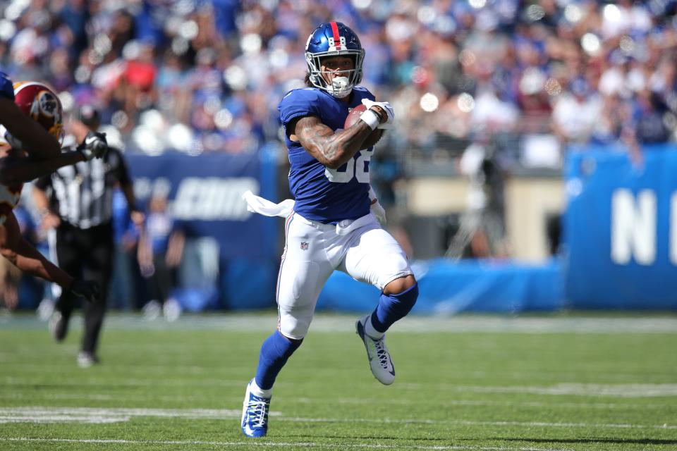 Sep 29, 2019; East Rutherford, NJ, USA; New York Giants tight end Evan Engram (88) runs with the ball against the Washington Redskins during the second quarter at MetLife Stadium. Mandatory Credit: Brad Penner-USA TODAY Sports