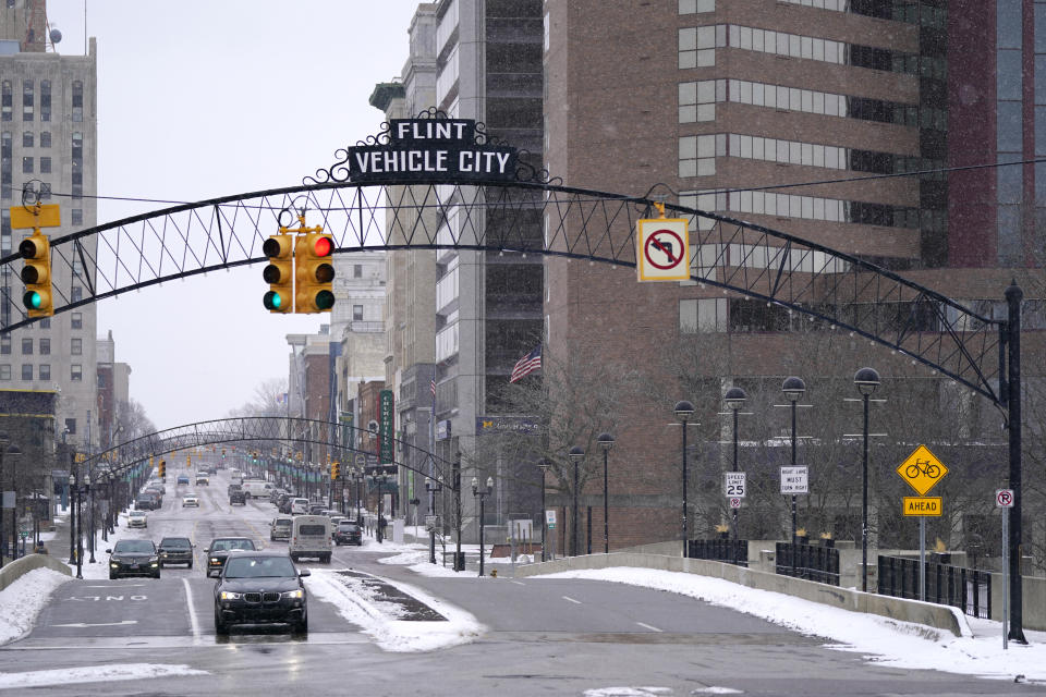 Downtown Flint, Mich., is seen, Thursday, Jan. 6, 2022. After Flint's water crisis, 35% of Black adults in the U.S. said they didn't drink tap water, up from 25%. High-profile cases of lead contamination in predominantly Black cities and a history of deception around the problem have led to a distrust of tap water, which can have long-term health and financial consequences. (AP Photo/Carlos Osorio)