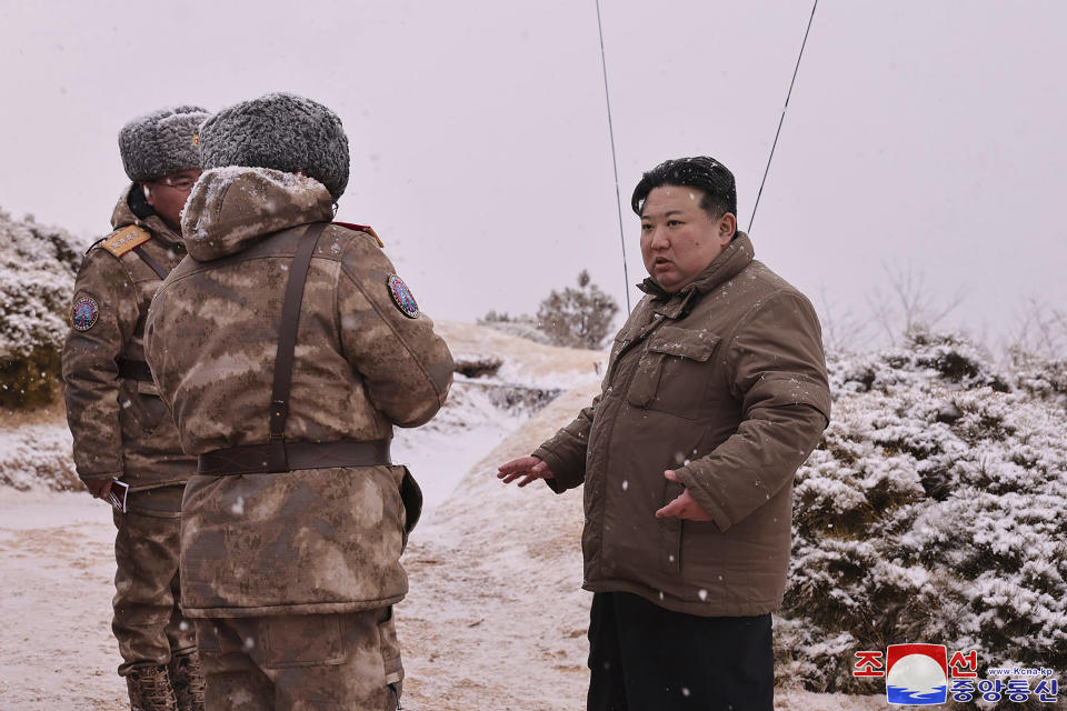 This photo provided by the North Korean government, shows North Korean leader Kim Jong Un, right, as he inspects a test firing of Pulhwasal-3-31 in North Korea Sunday, Jan. 28, 2024. Independent journalists were not given access to cover the event depicted in this image distributed by the North Korean government. The content of this image is as provided and cannot be independently verified. Korean language watermark on image as provided by source reads: "KCNA" which is the abbreviation for Korean Central News Agency. (Korean Central News Agency/Korea News Service via AP)