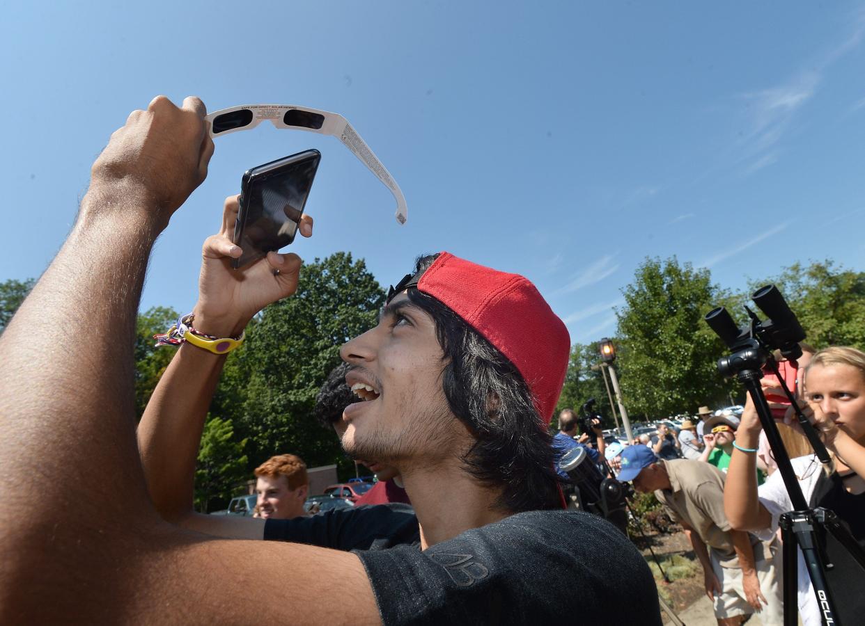 NASA recommends specialized eye protection meant for solar eclipse viewing. Regular sunglasses are not safe for viewing the sun. Looking at the sun through a camera lens, telescope or binoculars while also using eclipse glasses can cause serious eye damage.