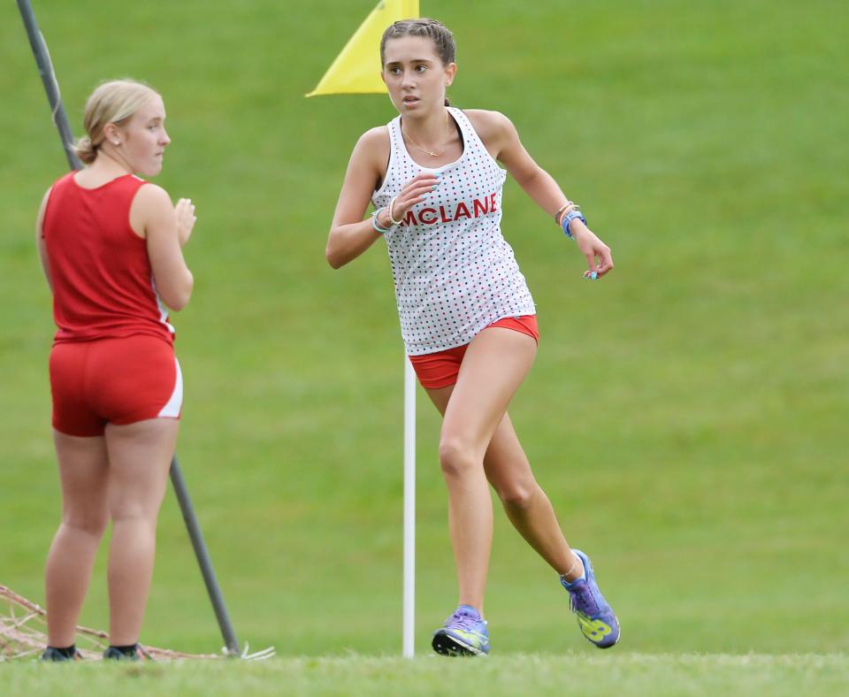 General McLane High School's Ella Wieczorek eyes the finish line in winning a dual cross country meet with Fort LeBoeuf.