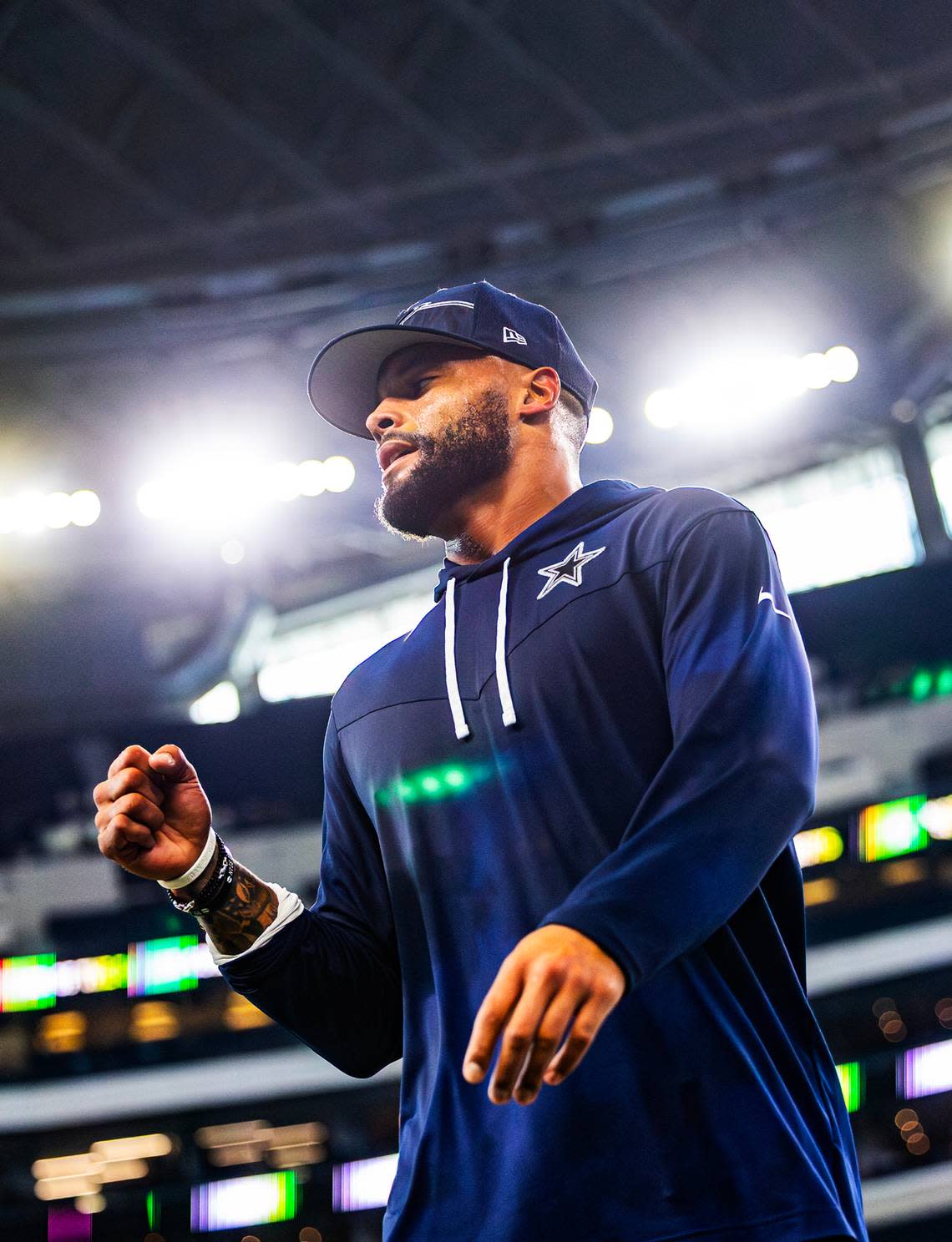 Dallas Cowboys Quarterback Dak Prescott wraps up a workout with his trainers prior to a preseason match up against the Las Vegas Raiders at AT&T Stadium in Arlington on Aug. 26, 2023.