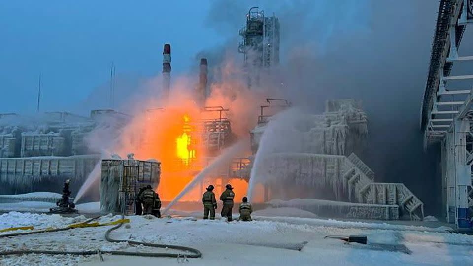 Firefighters work to extinguish a fire at a terminal belonging to Novatek, Russia's largest liquefied natural gas producer, in the port of Ust-Luga, Russia, on Sunday. - Alexander Drozdenko/Leningrad Region Governor/Telegram/Reuters