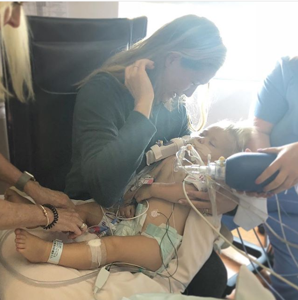 Bode Miller's wife Morgan holds her dying daughter, Emmy, after she was found floating in a neighbour's pool in California. Source: Instagram/Morgan Miller
