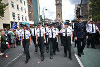 <p>PSNI and Garda officers representative of the gay community take part in the Belfast Gay Pride parade on August 5, 2017 in Belfast, Northern Ireland. (Photo: Charles McQuillan/Getty Images) </p>