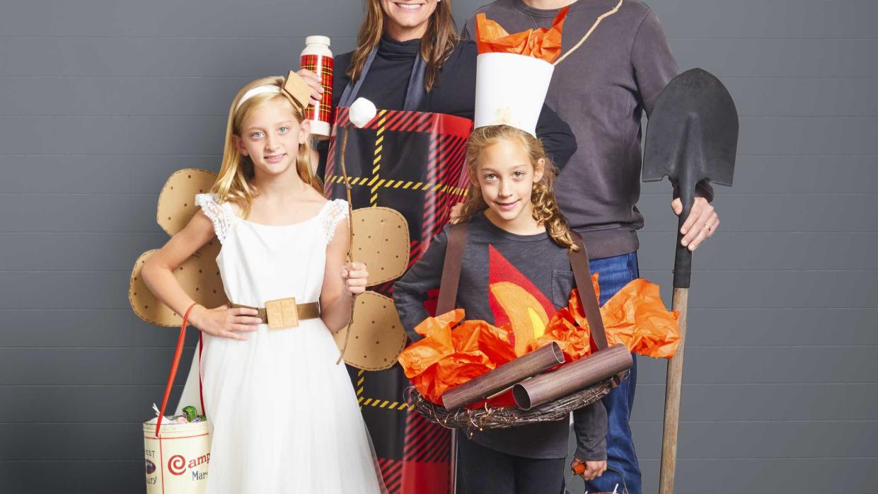 family dressed in campfire halloween costumes