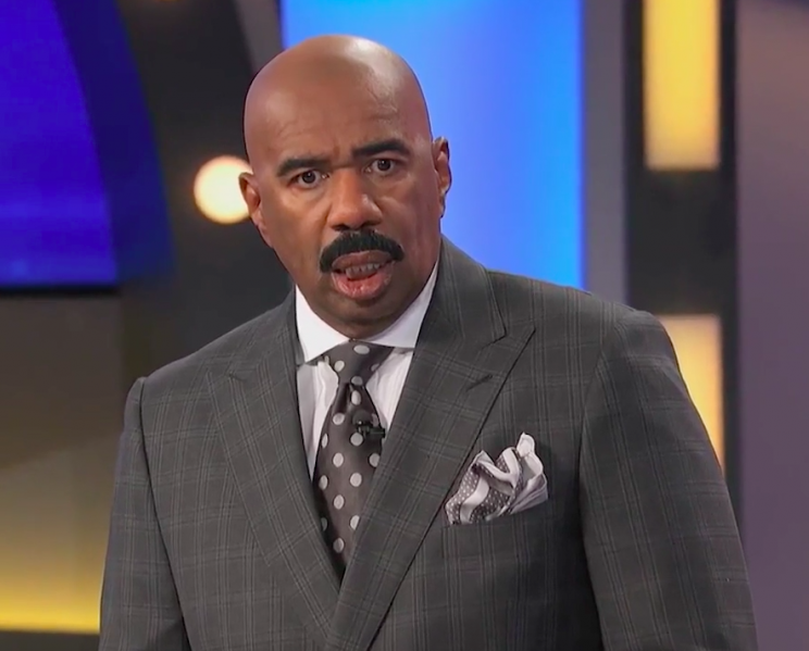Steve Harvey reacts to contestant’s T-rex impression on <em>Family Feud</em>. (Photo: Family Feud)