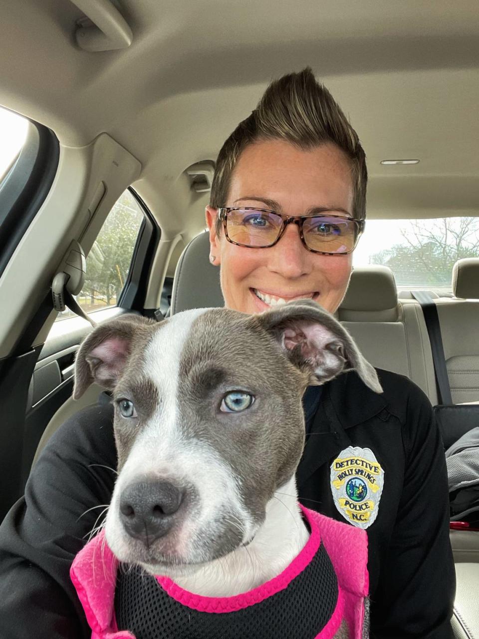 Miss Percy, held by Holly Springs Detective Dieckmann, was taken from an adoption fundraising event in Holly Springs on Dec. 12, 2021. The Holly Springs Police Department found her Jan. 5, 2022.