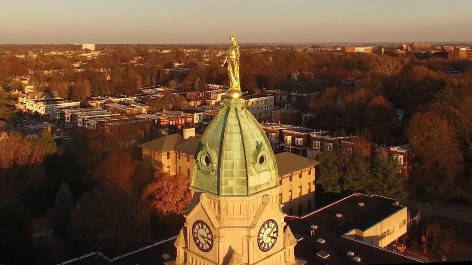 A statue of Mary is atop the Basilica Shrine of Our Lady of the Miraculous Medal in Philadelphia.  The Vatican recently named the shrine a minor basilica.