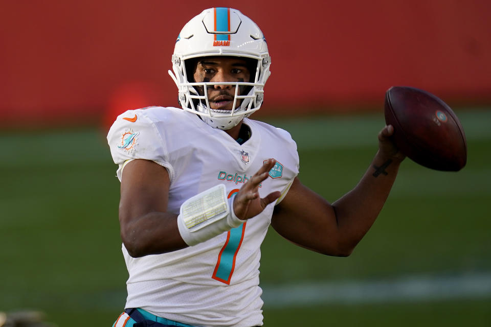 Miami Dolphins quarterback Tua Tagovailoa (1) looks to throw against the Denver Broncos during the first half of an NFL football game, Sunday, Nov. 22, 2020, in Denver. (AP Photo/David Zalubowski)