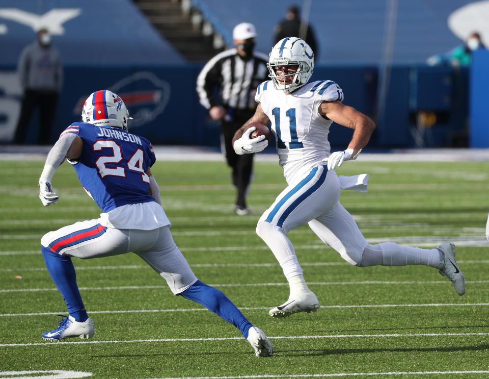 Colts receiver Michael Pittman Jr.  looks for extra yards after one of his five catches. 