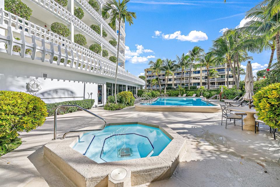 The Paulinos' apartment overlooks the pool courtyard.