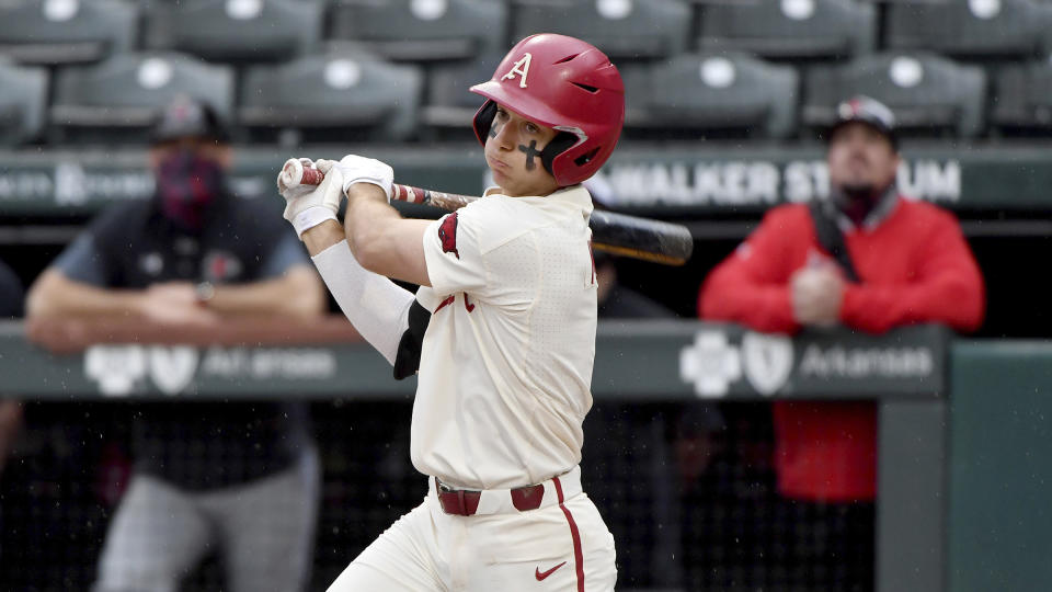 FILE - Arkansas batter Robert Moore bats against Southeast Missouri State during an NCAA baseball game in Fayetteville, Ark., in this Sunday, Feb. 28, 2021, file photo. Top-ranked Arkansas is closing in on its first SEC championship in baseball since 2004 after winning two of three one-run games at Tennessee. (AP Photo/Michael Woods, File)