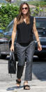 <p>Garner went to church on Sunday in a modest yet chic ensemble of a loose V-neck tank, gray trousers, and black sandals with chain-link detailing (shop a similar look <a rel="nofollow noopener" href="http://www.barneys.com/product/barneys-new-york-chain-embellished-leather-sandals-505221194.html" target="_blank" data-ylk="slk:here;elm:context_link;itc:0;sec:content-canvas" class="link ">here</a>). The mother of three accessorized with a sleek black shoulder bag and tortoiseshell sunglasses.</p>