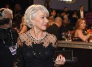 <p>Mirren sported a classy scarlet red mani that stood out against her elegant black dress. (Photo: Getty Images) </p>