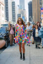 <p>The ‘Vogue’ China editor-at-large’s sartorial story <i>never </i>disappoints. Here, she wears a Jeremy Scott dress, mirrored lenses, and patent leather calf-high boots while navigating through New York City. </p>