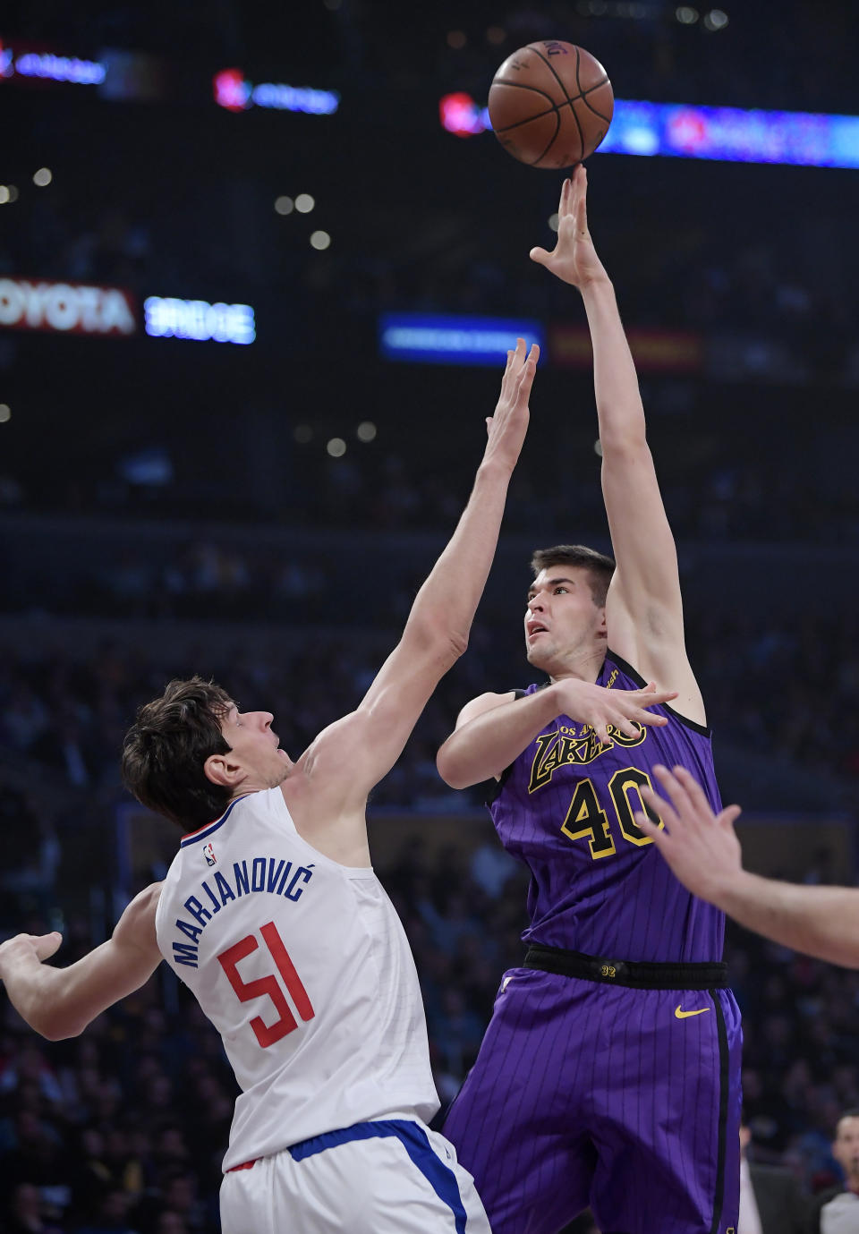 Los Angeles Lakers center Ivica Zubac, right, shoots as Los Angeles Clippers center Boban Marjanovic defends during the first half of an NBA basketball game Friday, Dec. 28, 2018, in Los Angeles. (AP Photo/Mark J. Terrill)