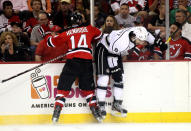 NEWARK, NJ - JUNE 02: Drew Doughty #8 of the Los Angeles Kings draws contact from Adam Henrique #14 of the New Jersey Devils during Game Two of the 2012 NHL Stanley Cup Final at the Prudential Center on June 2, 2012 in Newark, New Jersey. (Photo by Elsa/Getty Images)