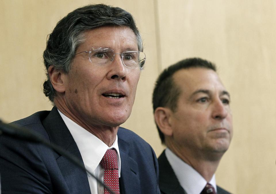 CIT Group CEO John Thain, left, and OneWest CEO Joseph Otting