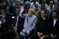 Mohammad Bagher Qalibaf, the most prominent candidate for the June 28, presidential election, who is Iran's parliament speaker, waves to media in his campaign rally in Tehran, Iran, Tuesday, June 18, 2024. (AP Photo/Vahid Salemi)