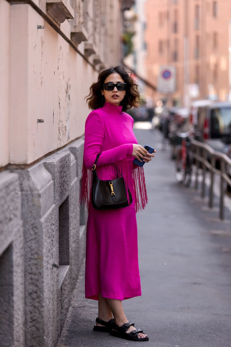 <p>Fringe and pink meet Chanel sandals and a Celine bag.</p>