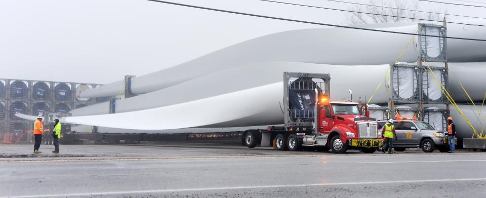 Safety crews help move windmill blades being stored on vacant land on the southeast corner of Interstate 90 and Station Road/Bayfront Connector in Harborcreek Township on Dec. 7, 2022.