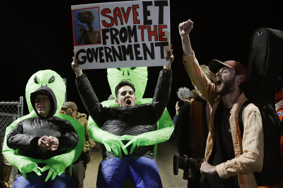 Mario Rayna, center, chants with others at an entrance to the Nevada Test and Training Range near Area 51, Sept. 20, 2019, near Rachel, Nev. People gathered at the gate inspired by the "Storm Area 51" internet hoax.  (Photo: John Locher/AP)