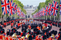 <p>The State Gun Carriage carries the coffin of Queen Elizabeth II passes down The Mall. (PA)</p> 