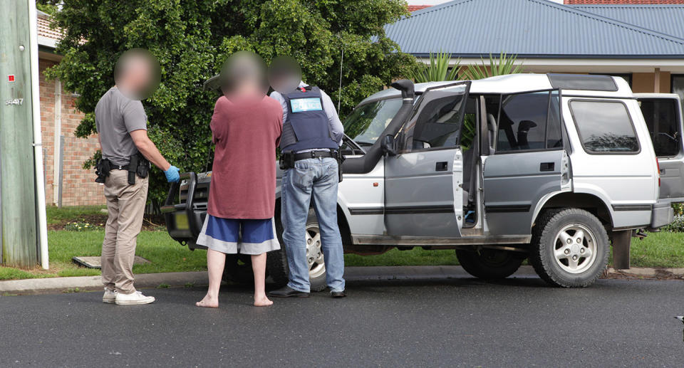 Three men and a woman have been charged for their alleged role in the group. Image: Australian Federal Police