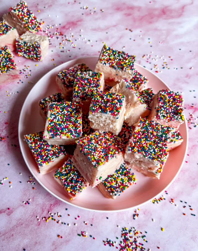 <p>Courtesy of Jessica Wrubel</p><p>These cute bites of tangy-sweet fudge are giving peak "Cruel Summer" vibes. What’s not cruel? You only need three ingredients to make them: white chocolate chips, sweetened condensed milk and pink lemonade Kool-Aid powder.</p><p><strong>Get the recipe:</strong> <a href="https://parade.com/food/pink-lemonade-fudge" rel="nofollow noopener" target="_blank" data-ylk="slk:Pink Lemonade Fudge;elm:context_link;itc:0;sec:content-canvas" class="link "><strong>Pink Lemonade Fudge</strong></a></p>