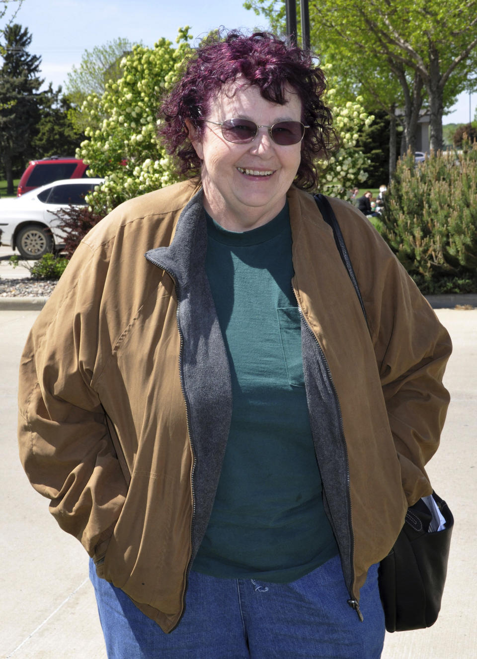 FILE - In this April 26, 2012 file photo, Cheryl Buswell-Robinson, widow of civil rights activist Ray Robinson who disappeared from Wounded Knee in 1973, stands outside her Sioux Falls, S.D., hotel after arriving for a weekend conference commemorating 40 years since the takeover of the South Dakota reservation village. Documents recently released by the FBI to a Buffalo, N.Y., lawyer shed new light on the 40-year-old case of Robinson, an activist and follower of Martin Luther King Jr. The FBI says Robinson was killed during the 1973 occupation of Wounded Knee, and it suspects militant members of the American Indian Movement are responsible. His body was never found. His widow said the family wants to bring his remains home for a proper burial.(AP Photo/Dirk Lammers, File)