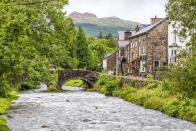 <p>Beddgelert is undoubtedly Snowdonia's loveliest village. Rich in character, history and unrivalled views, this picturesque stone-built village is ideal for ramblers to spend a long weekend. Don't forget your <a href="https://www.countryliving.com/uk/travel-ideas/staycation-uk/a34093927/best-hiking-boots/" rel="nofollow noopener" target="_blank" data-ylk="slk:hiking boots;elm:context_link;itc:0;sec:content-canvas" class="link ">hiking boots</a>. </p>