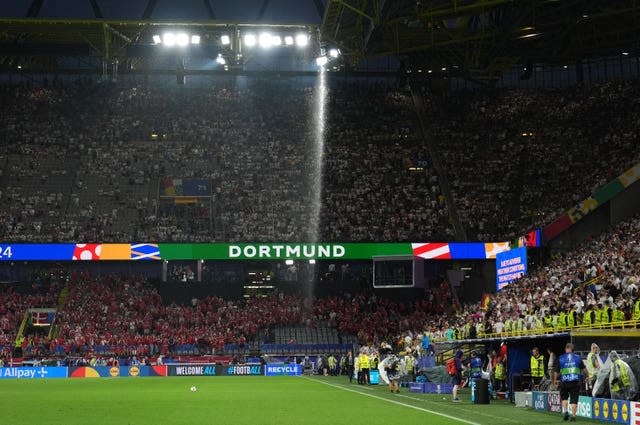 Rain falls from the top of a stand at the Westfalenstadion